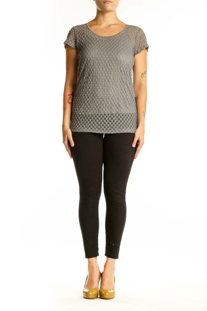 Gray textured short sleeve knit top with quilted geometric pattern, front view