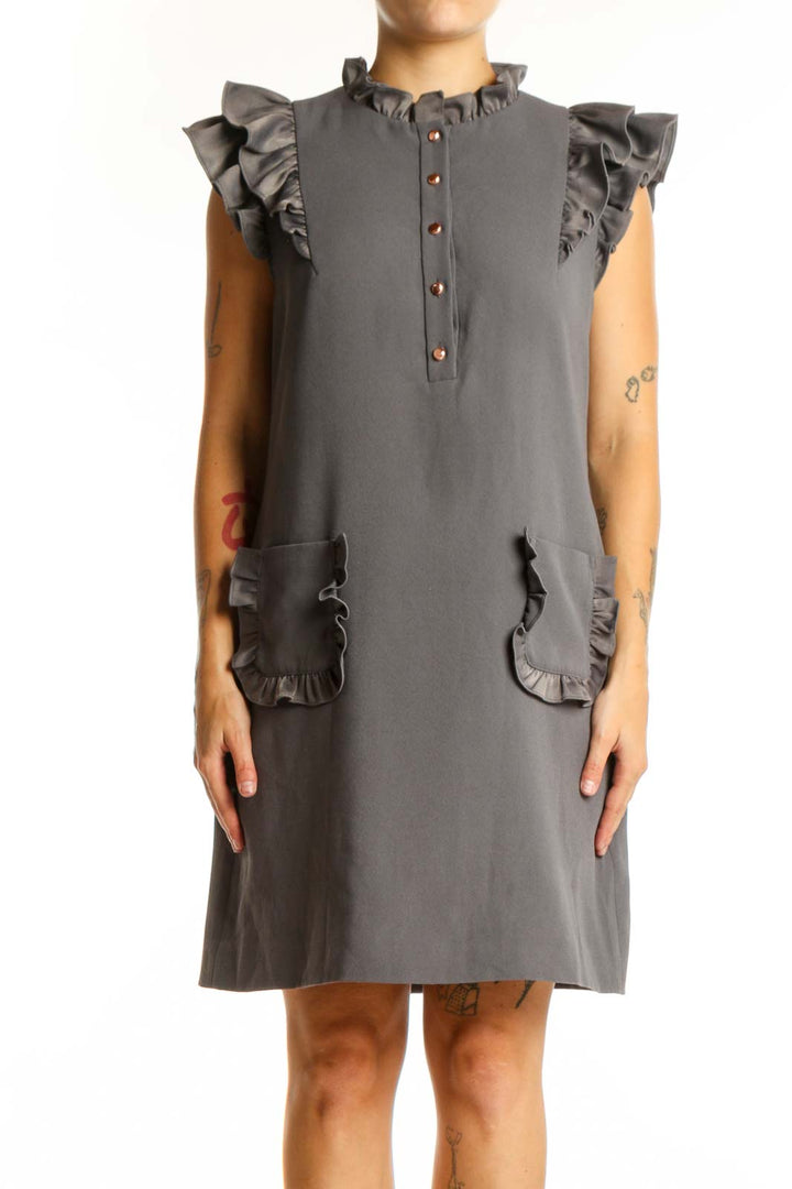 Gray ruffle pocket shift dress with button-front closure and ruffled cap sleeves, front view