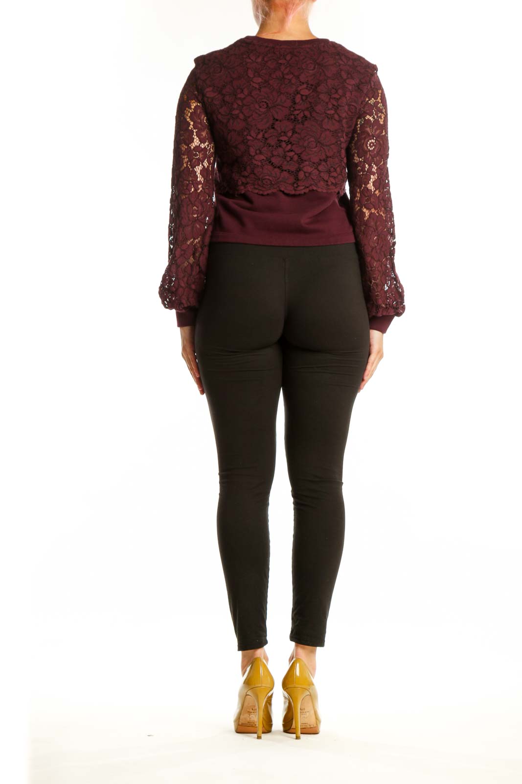 Back view of burgundy lace cropped knit top showing lace sleeve detail and cropped silhouette