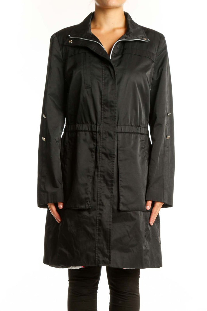 Black Calvin Klein windbreaker coat with full zip closure and cinched waist, front view on model