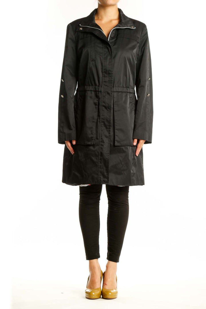 Black Calvin Klein windbreaker coat with full zip closure and cinched waist, front view on model