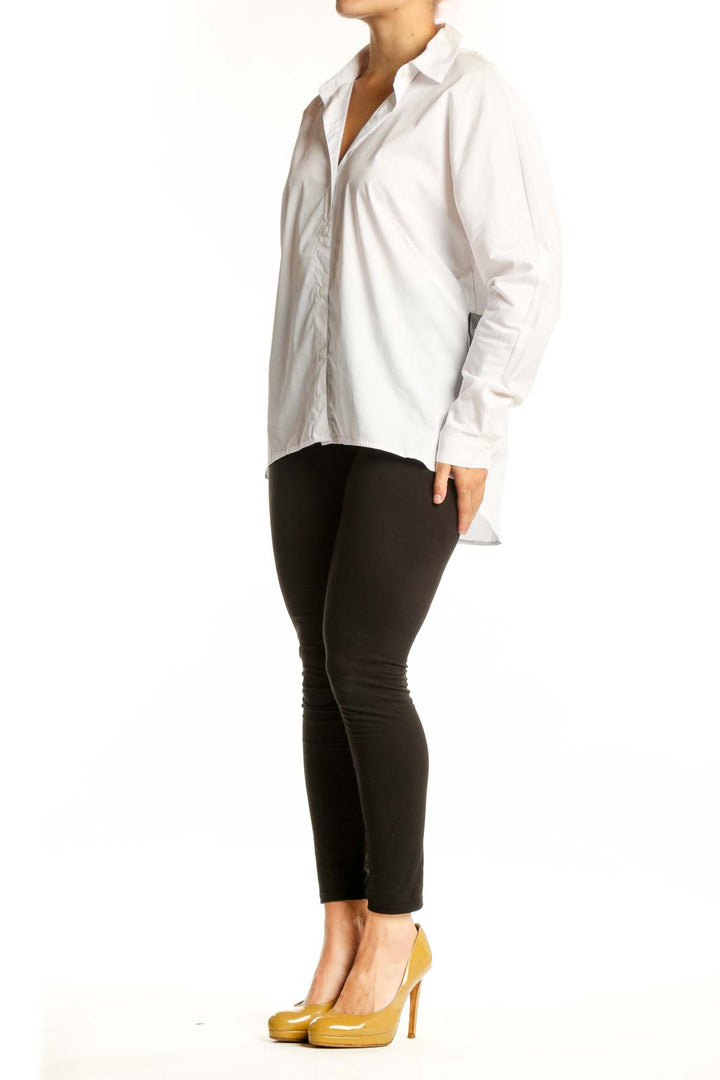 White button-up collared shirt with long sleeves, front view on model