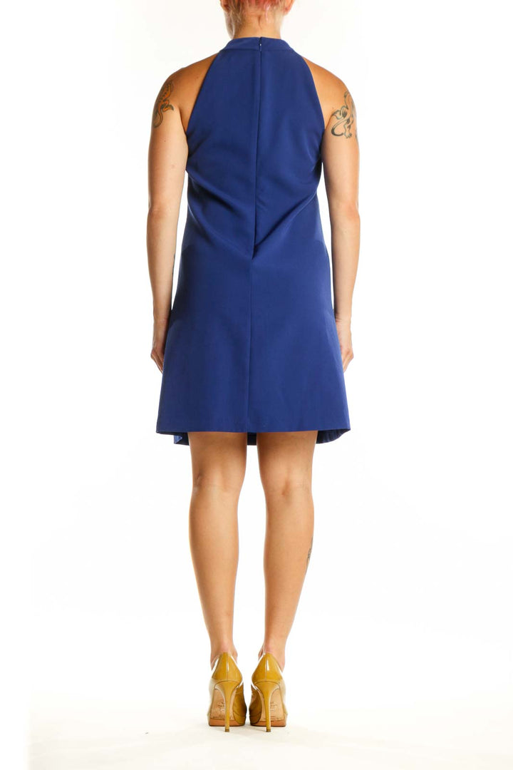 Navy ruffle halter sleeveless dress by Vince Camuto, back view displaying ruffled trim design