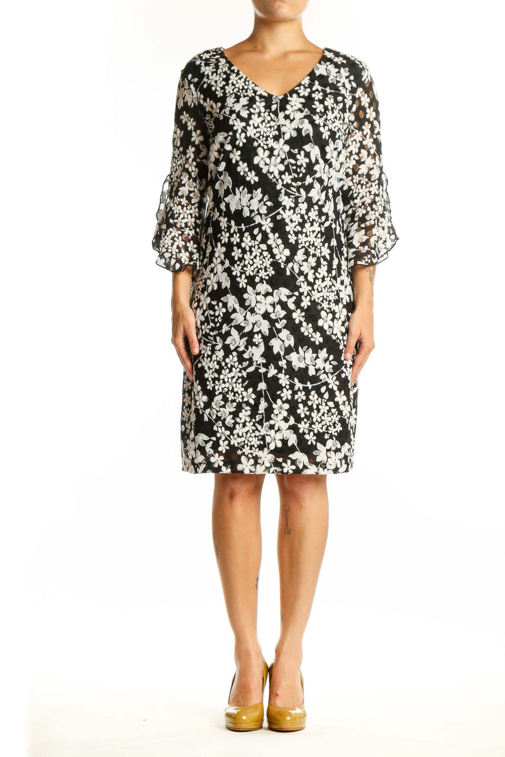 Black and white floral print dress with three-quarter sleeves and V-neckline, front view