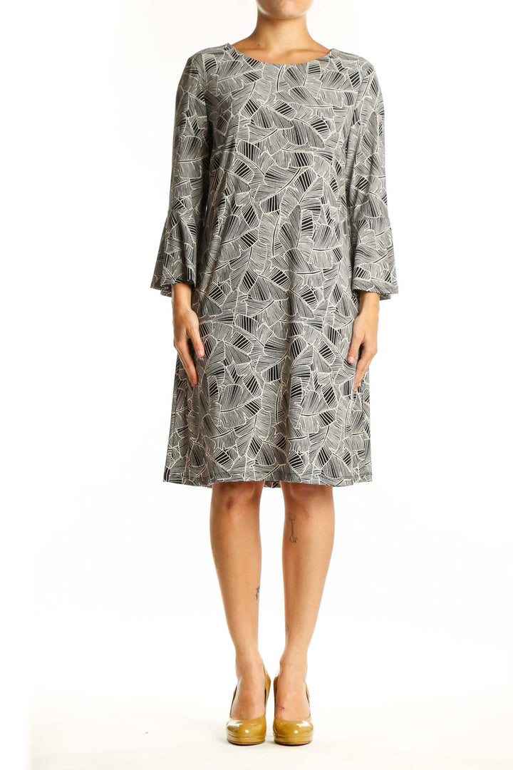 Tommy Hilfiger gray geometric print shift dress with bell sleeves, front view on model