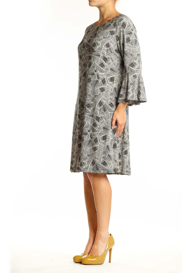 Tommy Hilfiger gray geometric print shift dress with bell sleeves, front view on model