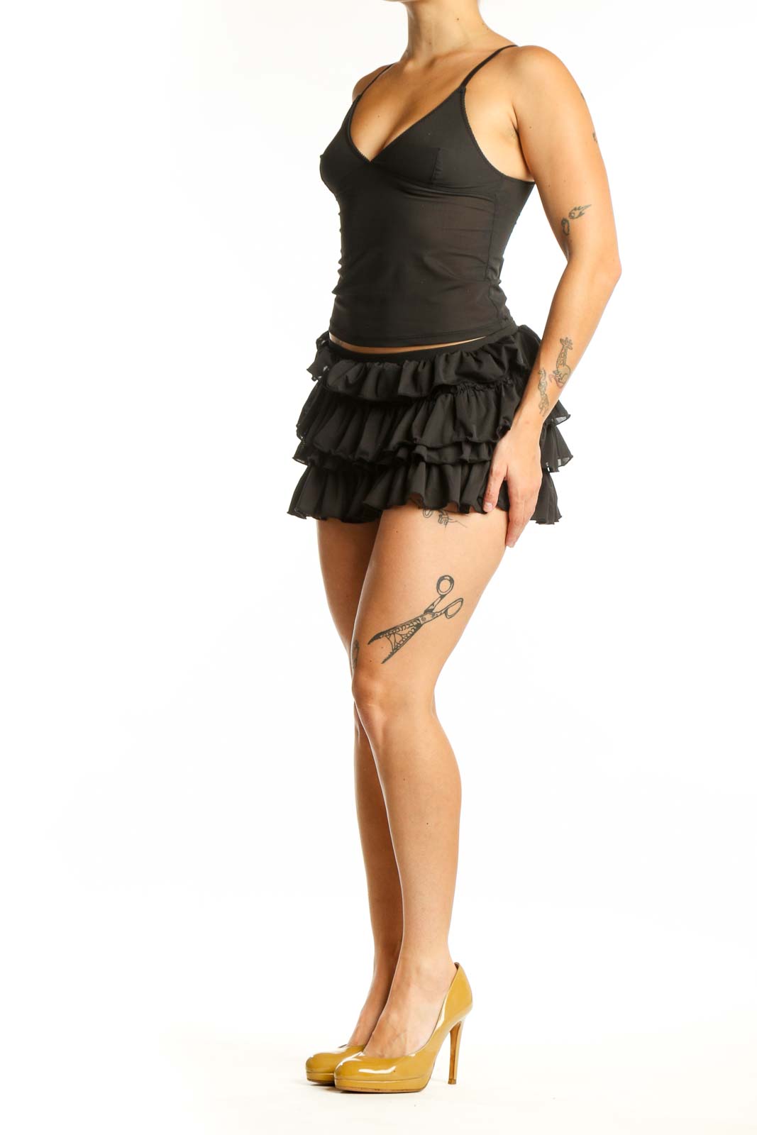 Black ruffle mini shorts with tiered ruffled detailing, high-waisted fit, front view