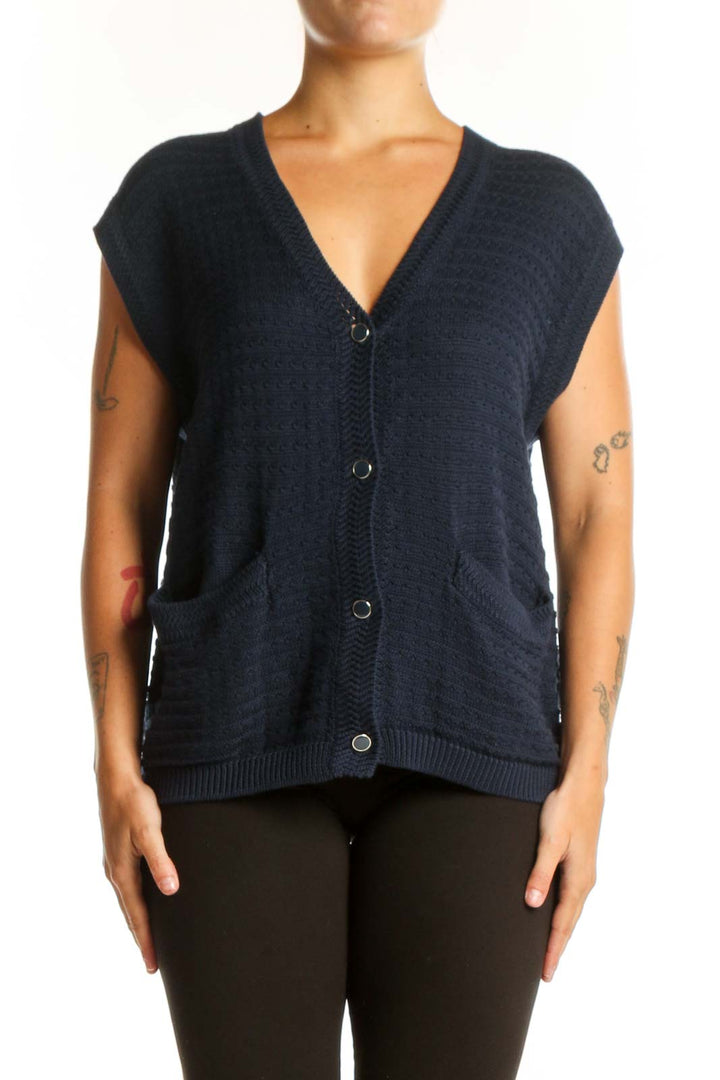 Navy cotton modal knit vest with V-neckline and button-front closure, worn with black pants