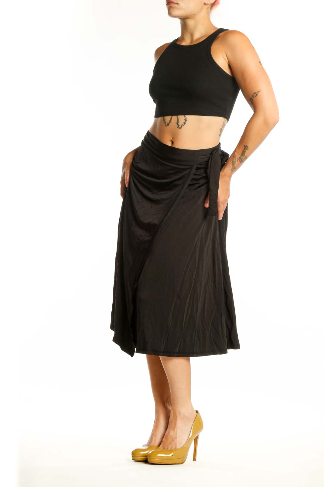 Black wrap midi skirt with tie detail and A-line silhouette by MB by Malene Birger, front view