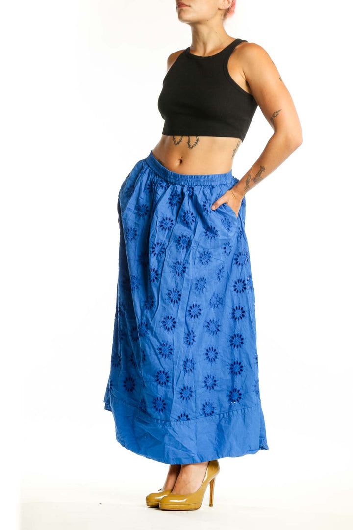 Blue floral print cotton maxi skirt with A-line silhouette and elastic waistband, front view