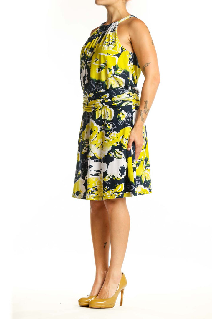Yellow and navy floral halter neck dress with gathered waist by BCBG MaxAzria, front view