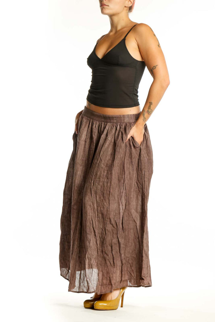 LINTICO brown Lyocell Ramie maxi skirt with A-line silhouette and elastic waistband, front view