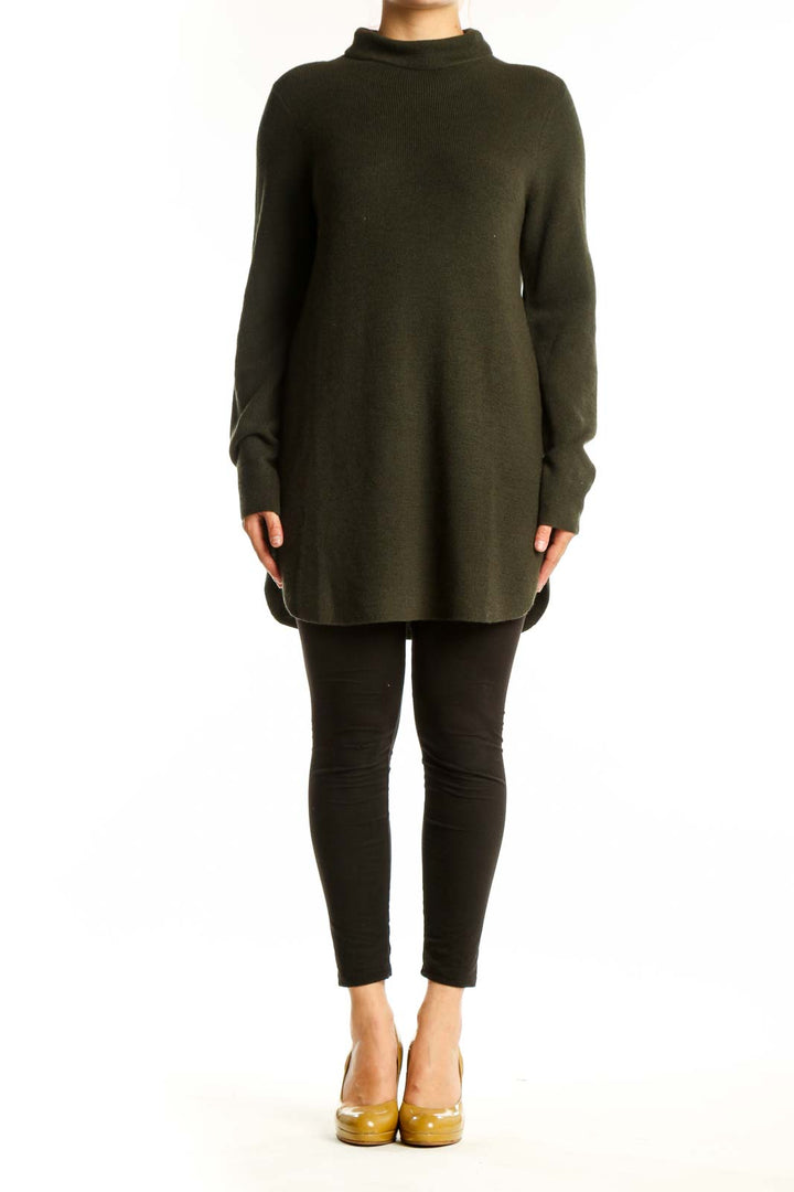 Olive green extra fine merino wool turtleneck sweater with oversized fit, front view