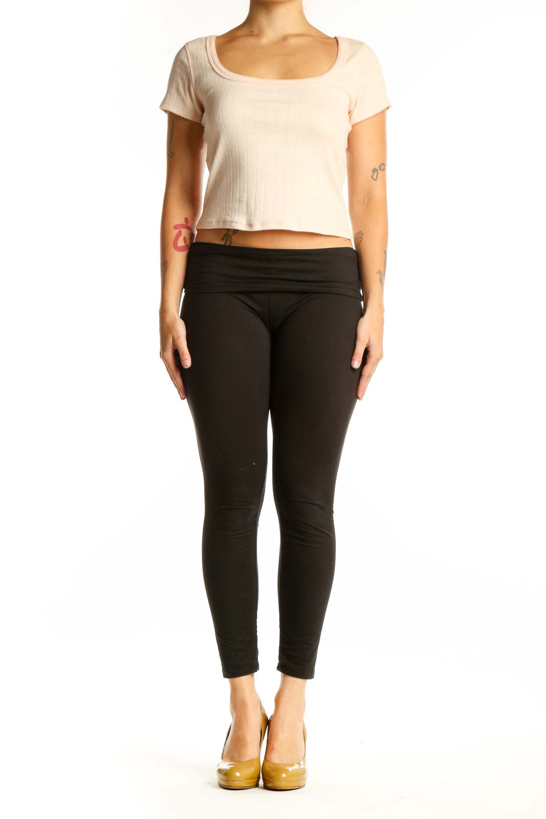 Cream ribbed crop top with short sleeves and rounded neckline, front view on model