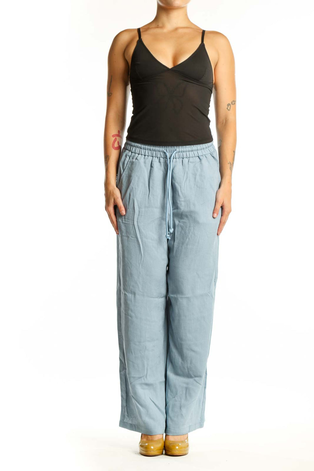 Blue wide leg drawstring pants with elastic waistband and side pockets, front view