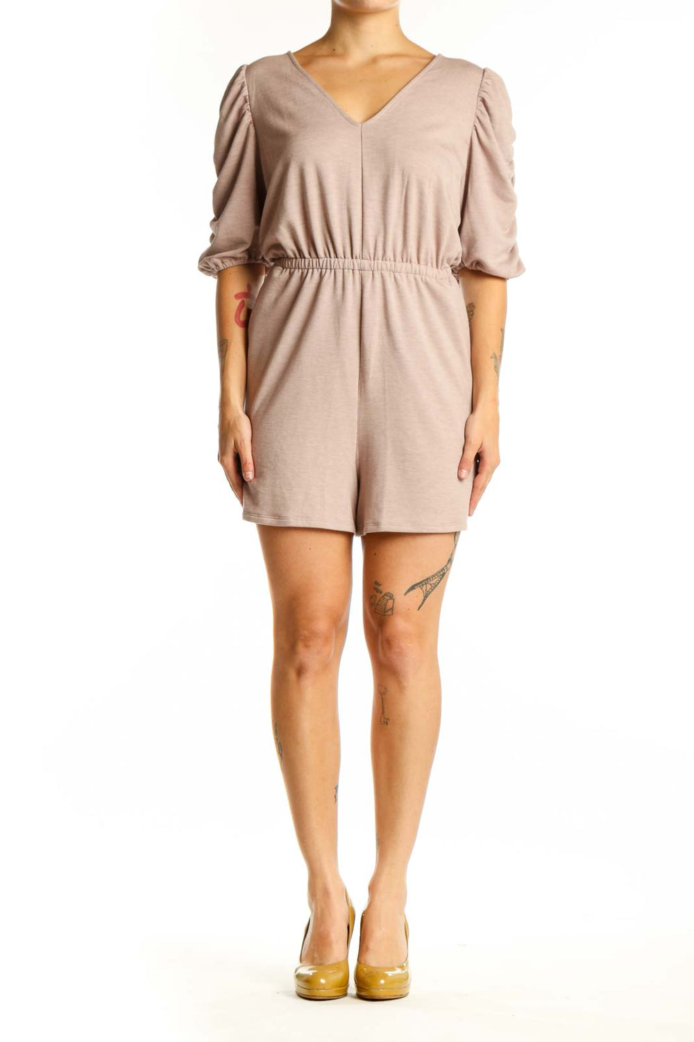 Beige puff sleeve romper with V-neckline and cinched waist, front view