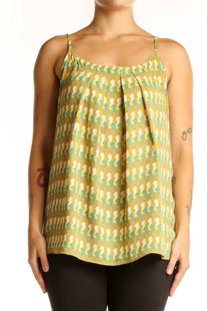 Yellow geometric print cami tank top with green and cream diamond pattern, spaghetti straps, and scoop neckline