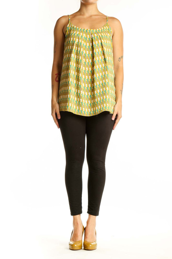 Yellow geometric print cami tank top with green and cream diamond pattern, spaghetti straps, and scoop neckline