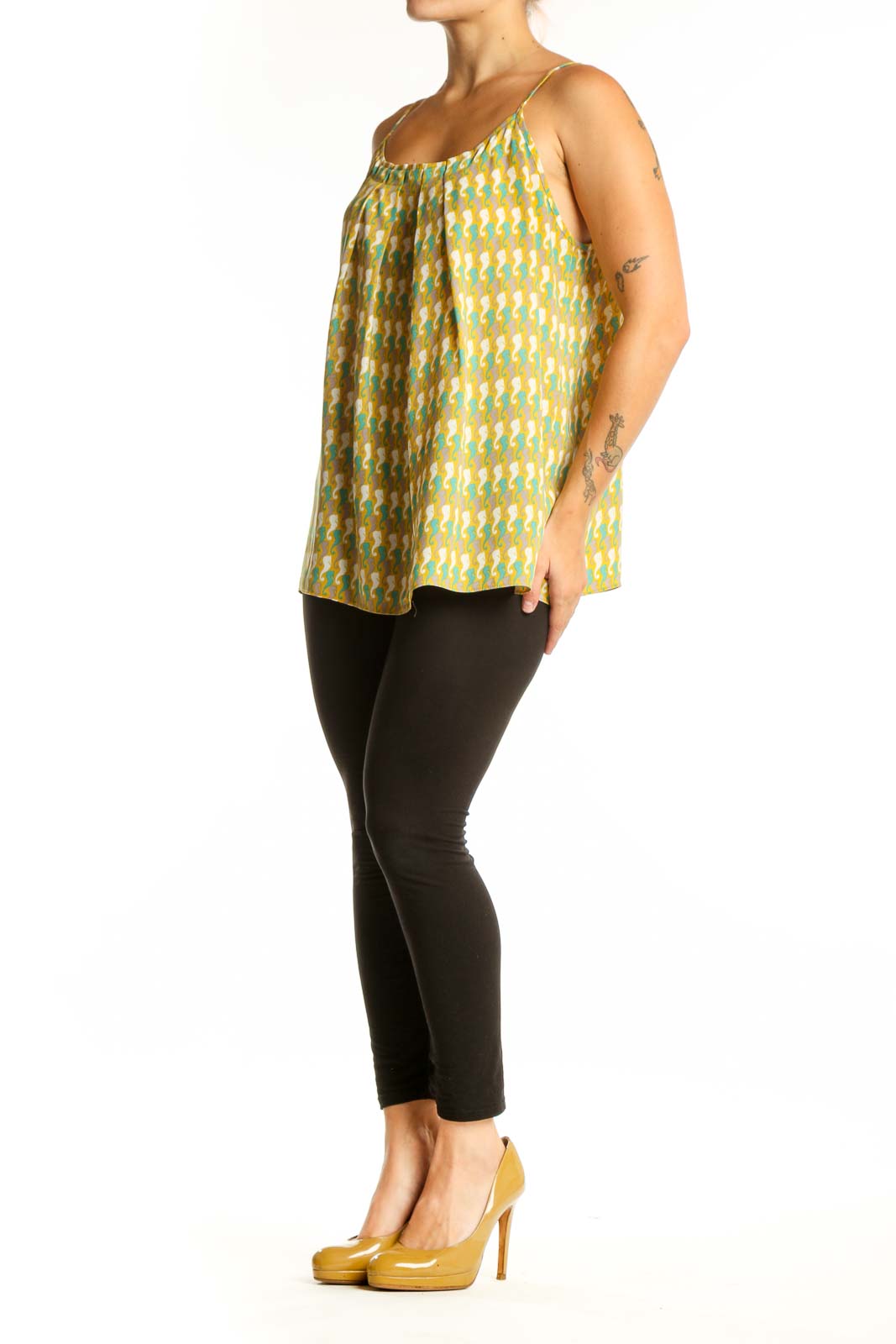 Yellow geometric print cami tank top with green and cream diamond pattern, spaghetti straps, and scoop neckline