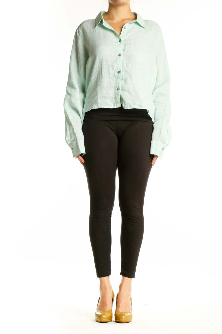 Mint green linen button-up crop shirt by Cynthia Rowley, front view showing cropped silhouette and collar detail