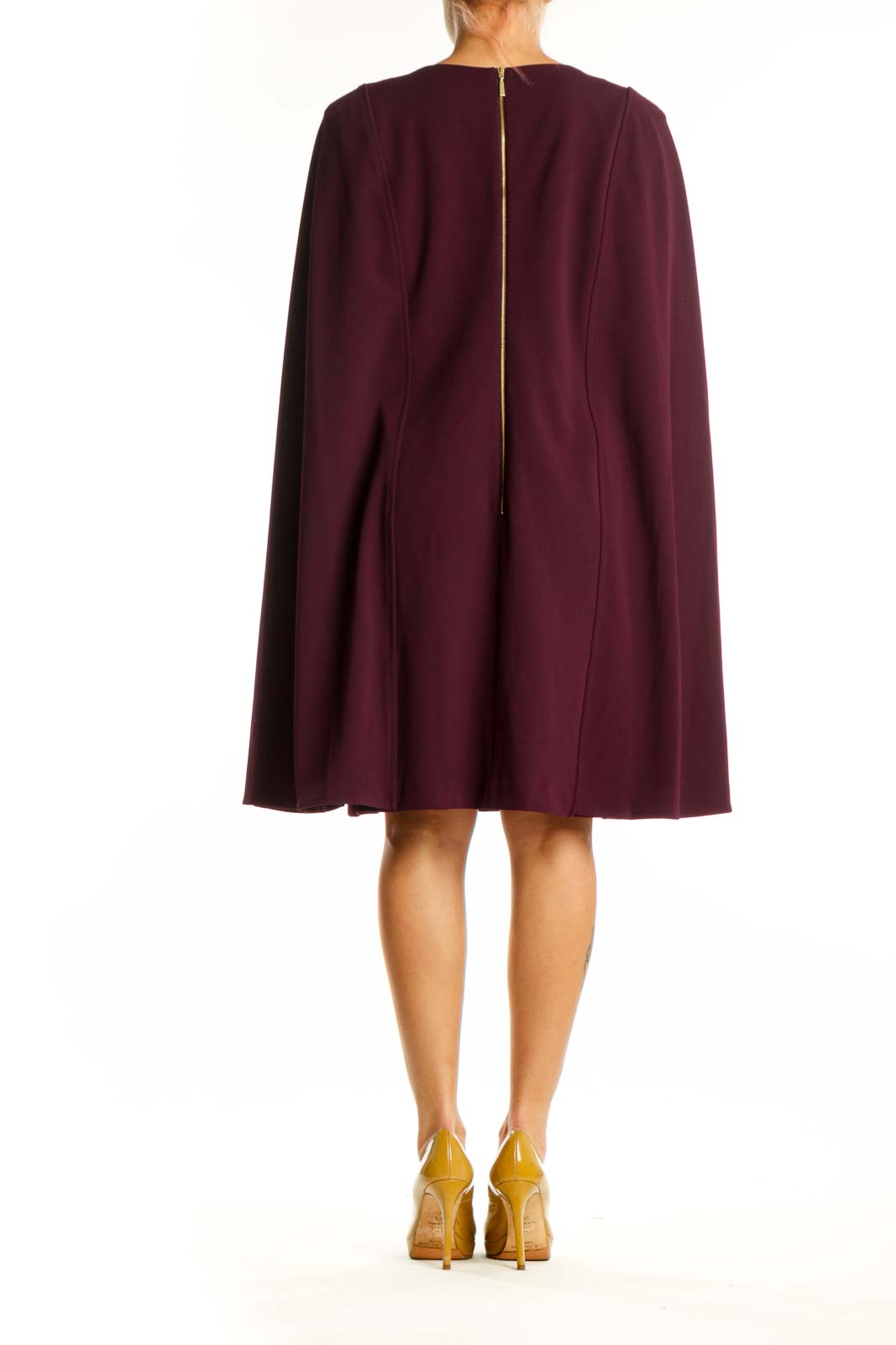 Burgundy cape sleeve A-line dress by Calvin Klein, back view displaying flowing cape sleeves and A-line silhouette