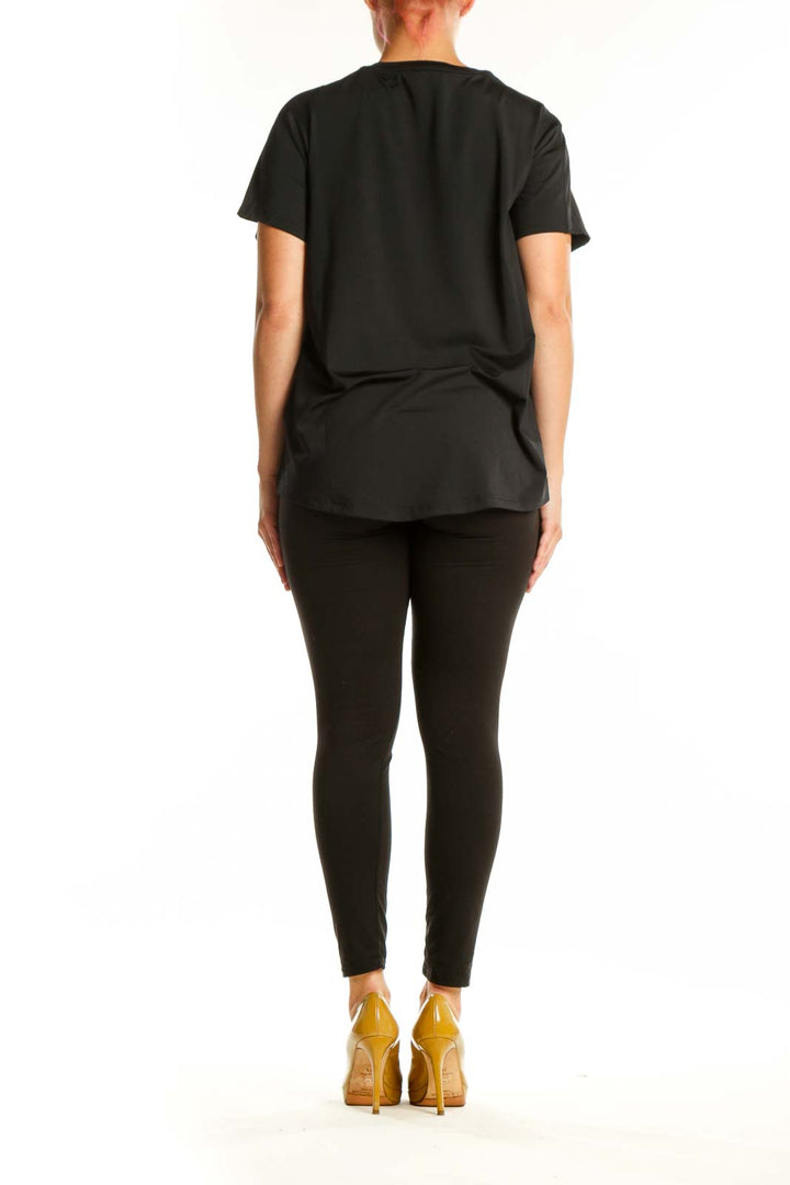 Black Adidas Activewear T-Shirt back view showing relaxed fit and white logo detail