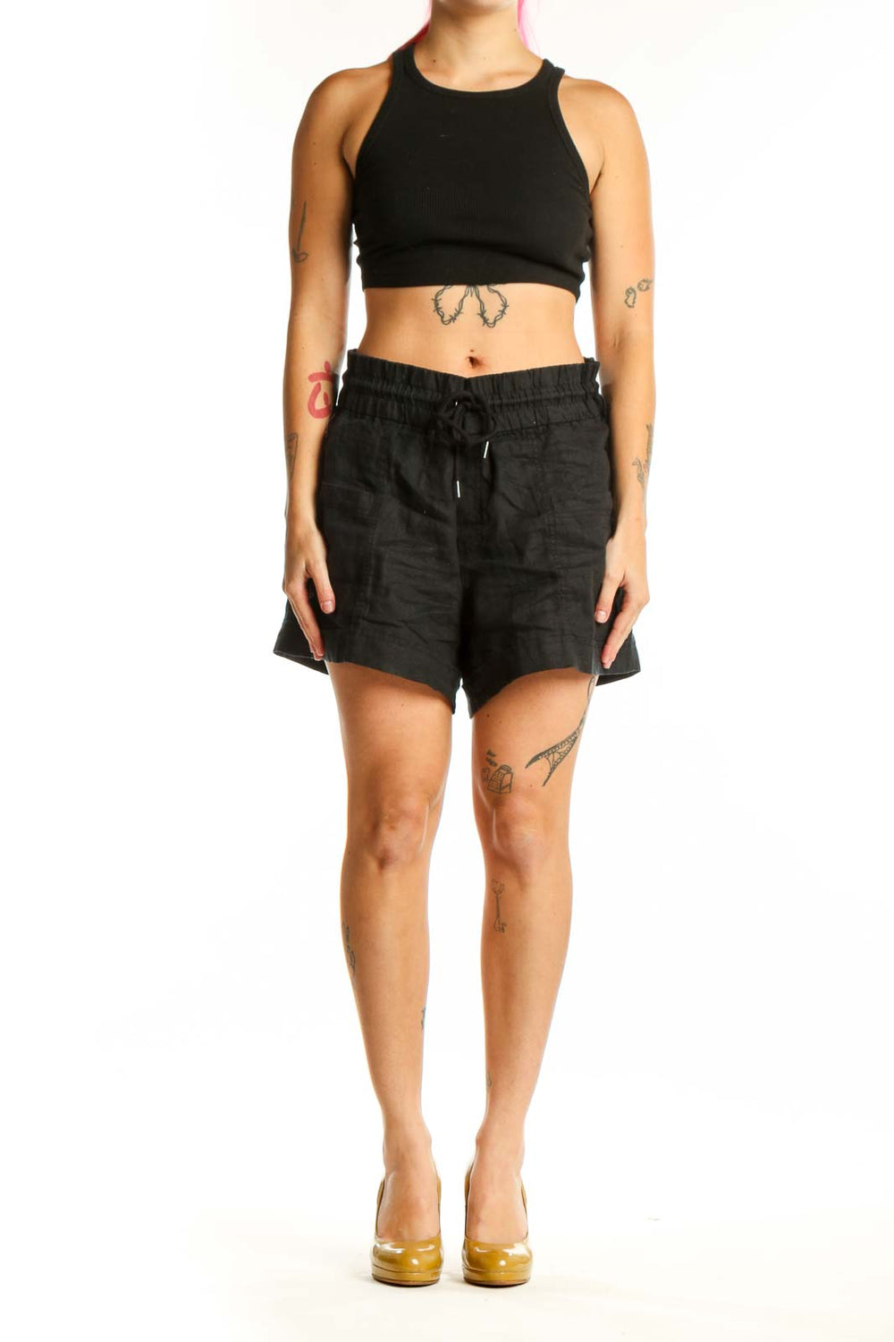 Black drawstring athletic shorts with elastic waistband and side pockets, front view