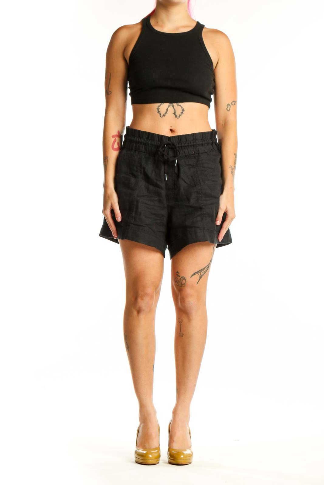 Black drawstring athletic shorts with elastic waistband and side pockets, front view