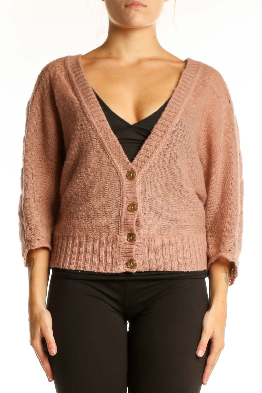 Beige mohair blend cardigan with V-neckline and button-front closure, worn over black top