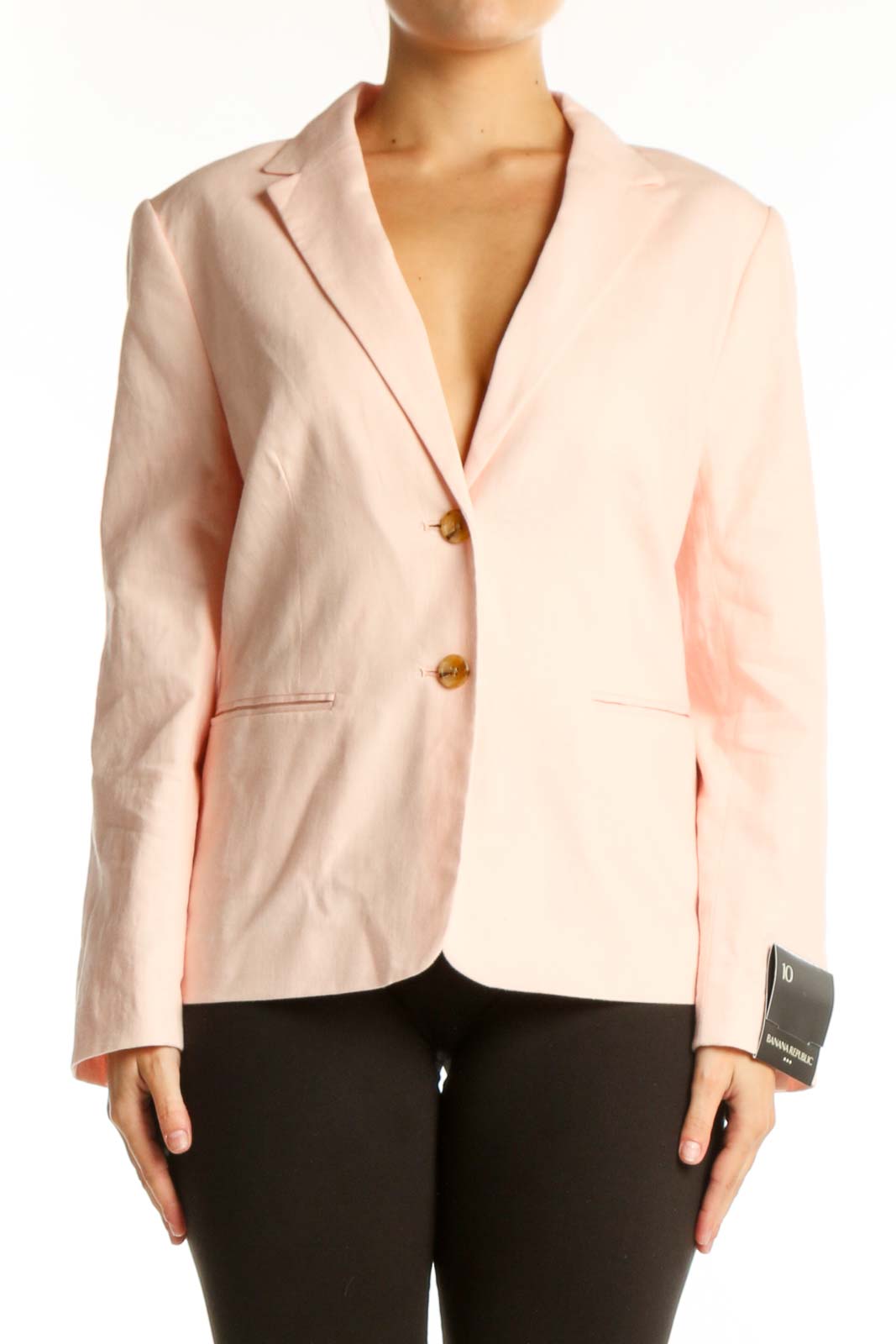 Blush pink Banana Republic blazer with notch lapels and gold-tone buttons, front view on model