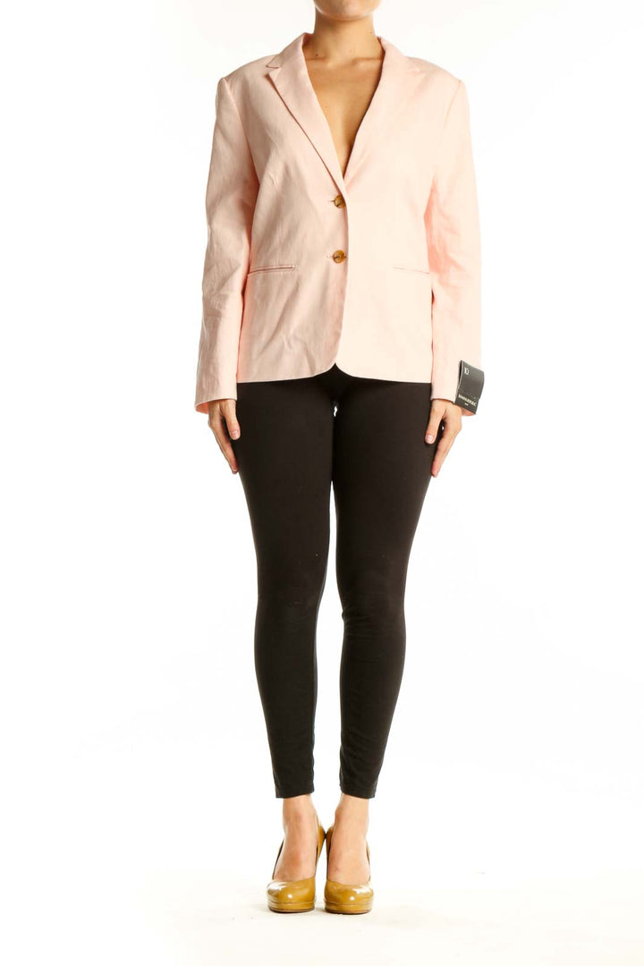 Blush pink Banana Republic blazer with notch lapels and gold-tone buttons, front view on model