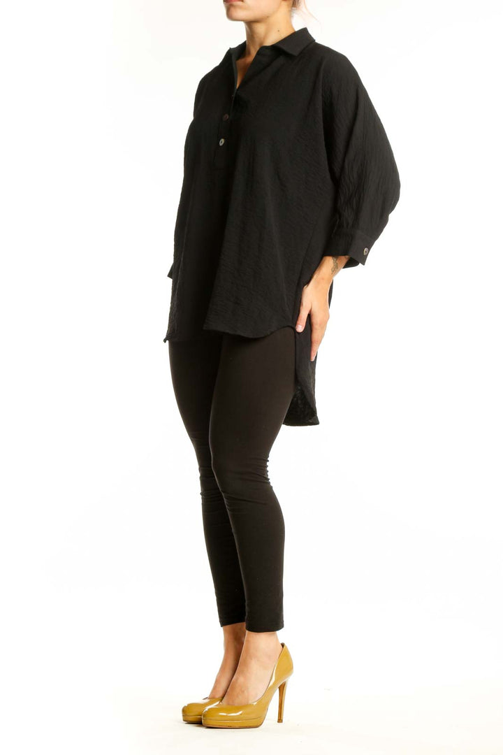 Black collared button-up tunic top with three-quarter sleeves and relaxed fit, front view