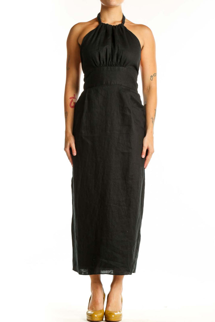 Black halter maxi dress with gathered bust and empire waist, front view