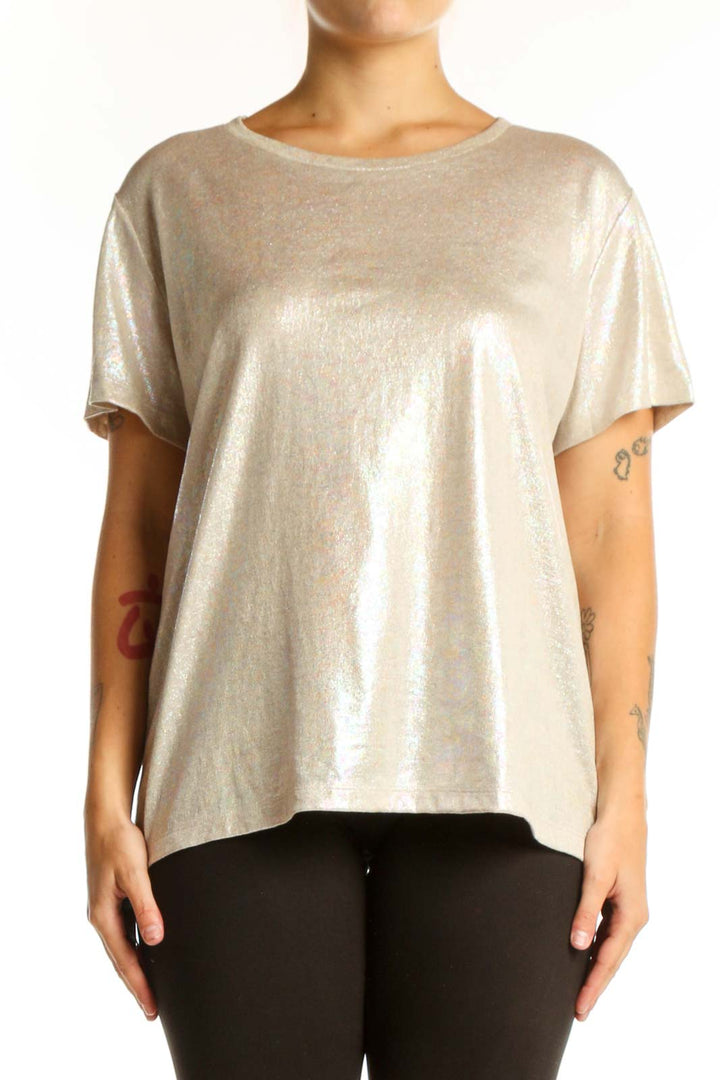 Gold metallic short sleeve top with crew neckline, front view on model wearing black leggings