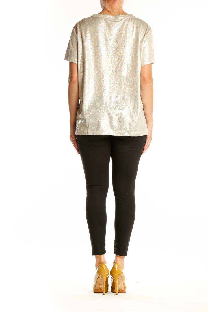 Gold metallic short sleeve top back view, showing relaxed fit and shimmer finish