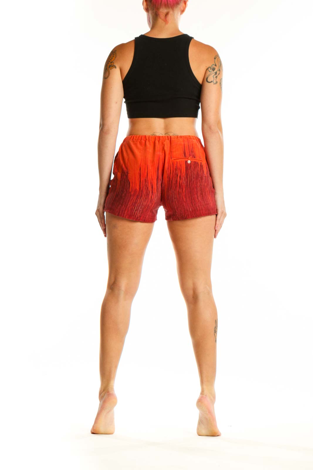 Red ombré silk shorts with drawstring waist, back view on model