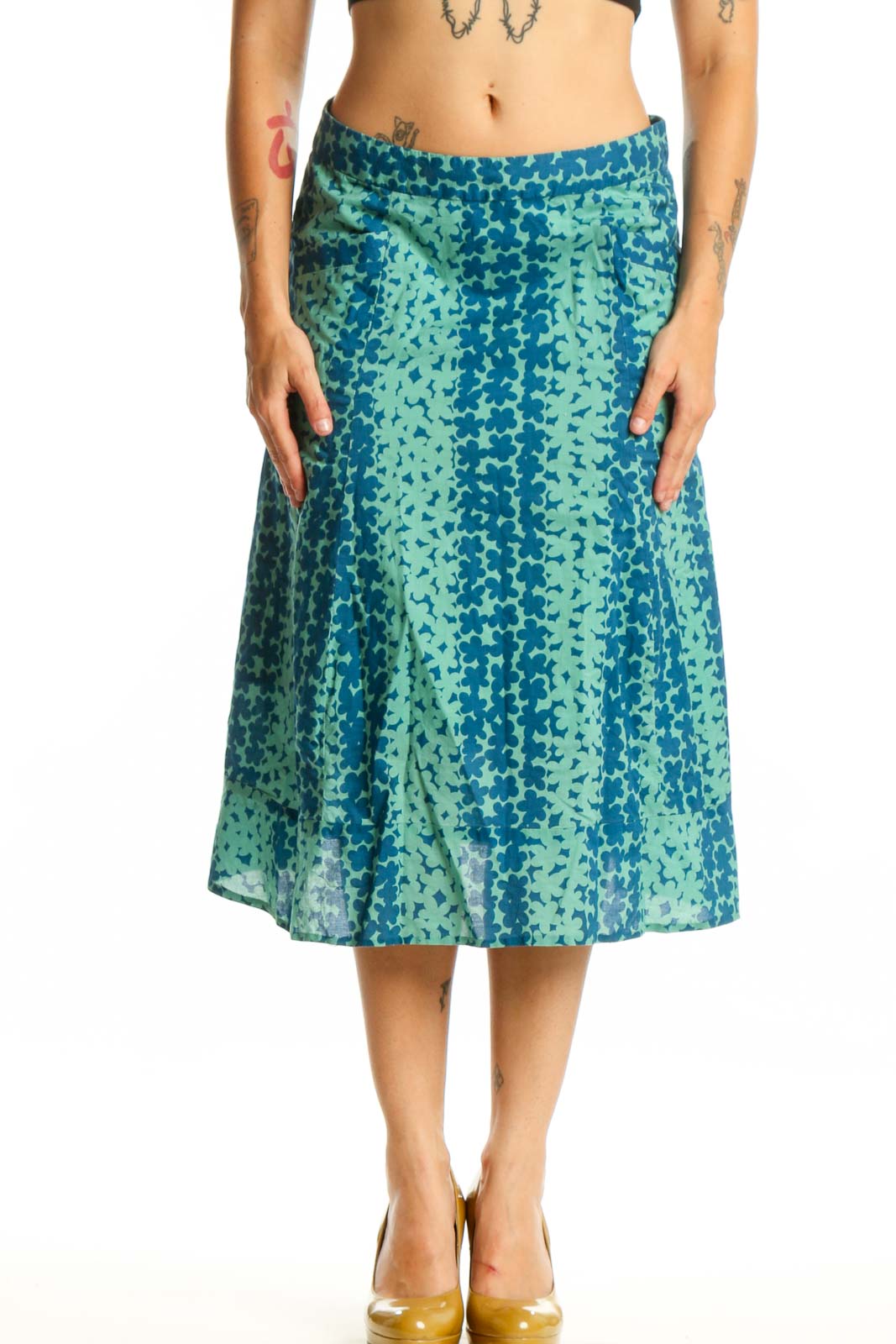 Teal and mint green floral A-line cotton skirt by Marc Jacobs, front view showing botanical print and midi length