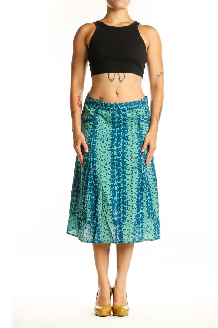 Teal and mint green floral A-line cotton skirt by Marc Jacobs, front view showing botanical print and midi length