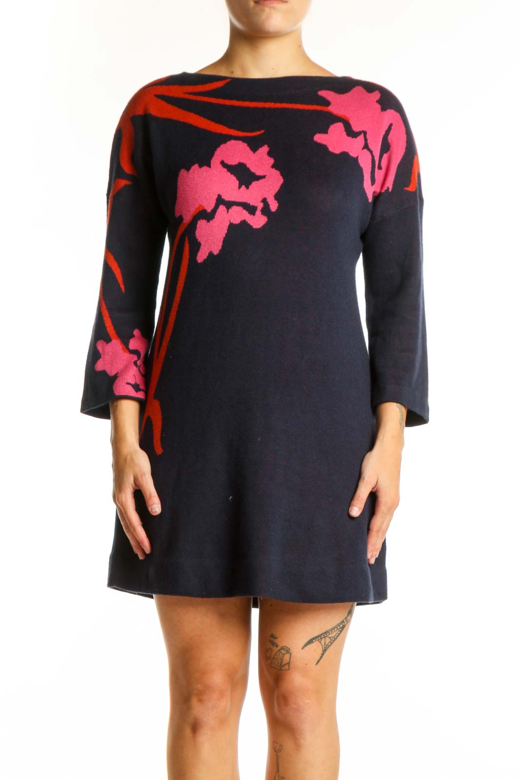 Navy knit dress with vibrant pink and red floral botanical design, three-quarter sleeves, front view