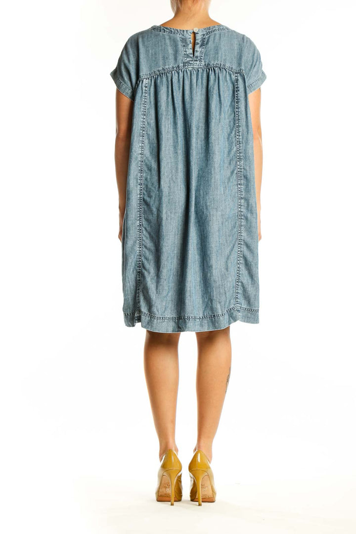 Blue Tencel short sleeve dress with gathered waist detail, back view