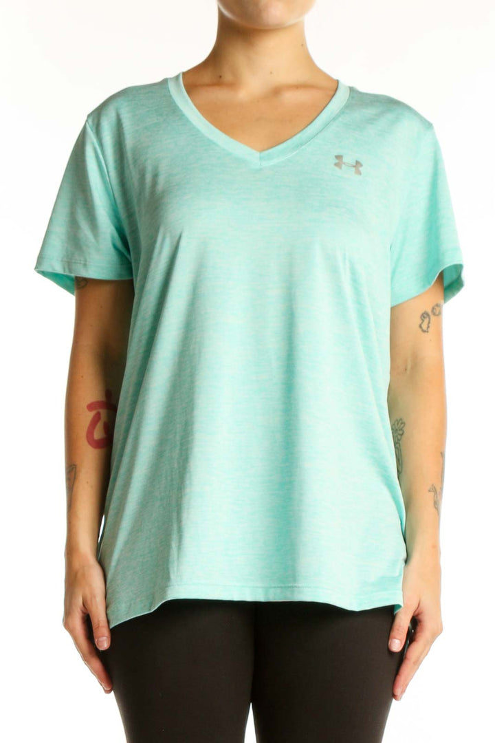 Mint green Under Armour V-neck athletic tee with short sleeves, front view on model