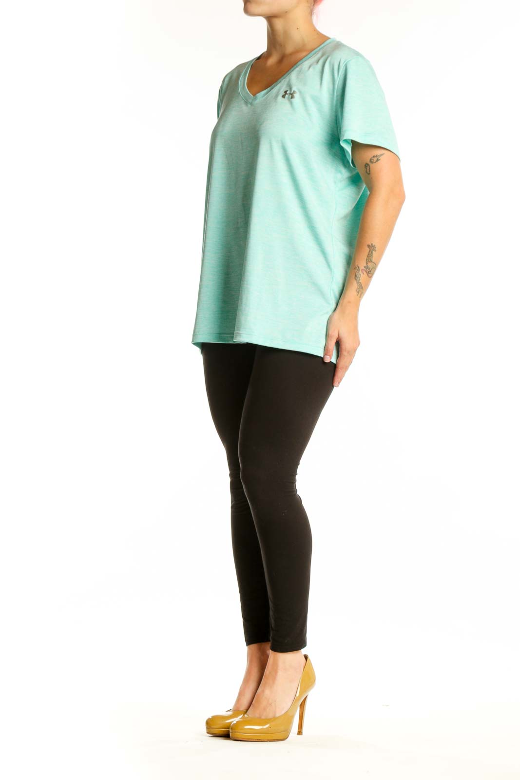 Mint green Under Armour V-neck athletic tee with short sleeves, front view on model