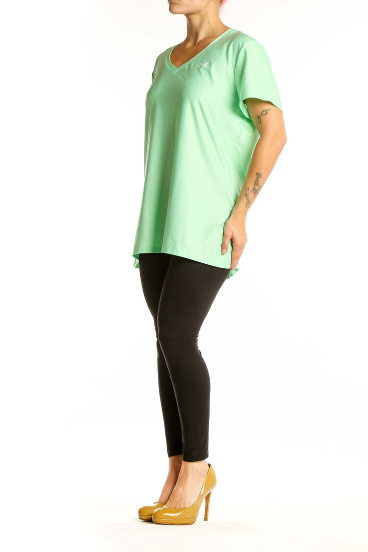 Mint green Under Armour v-neck activewear t-shirt front view on model, size XL