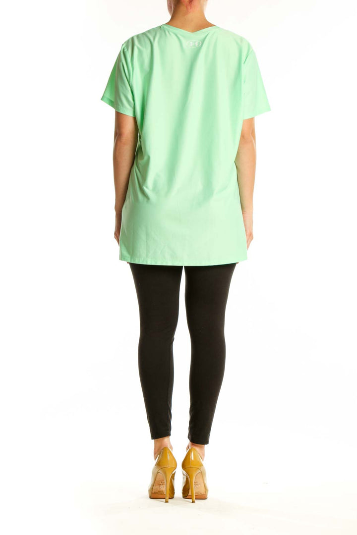 Mint green Under Armour v-neck activewear t-shirt back view on model, size XL