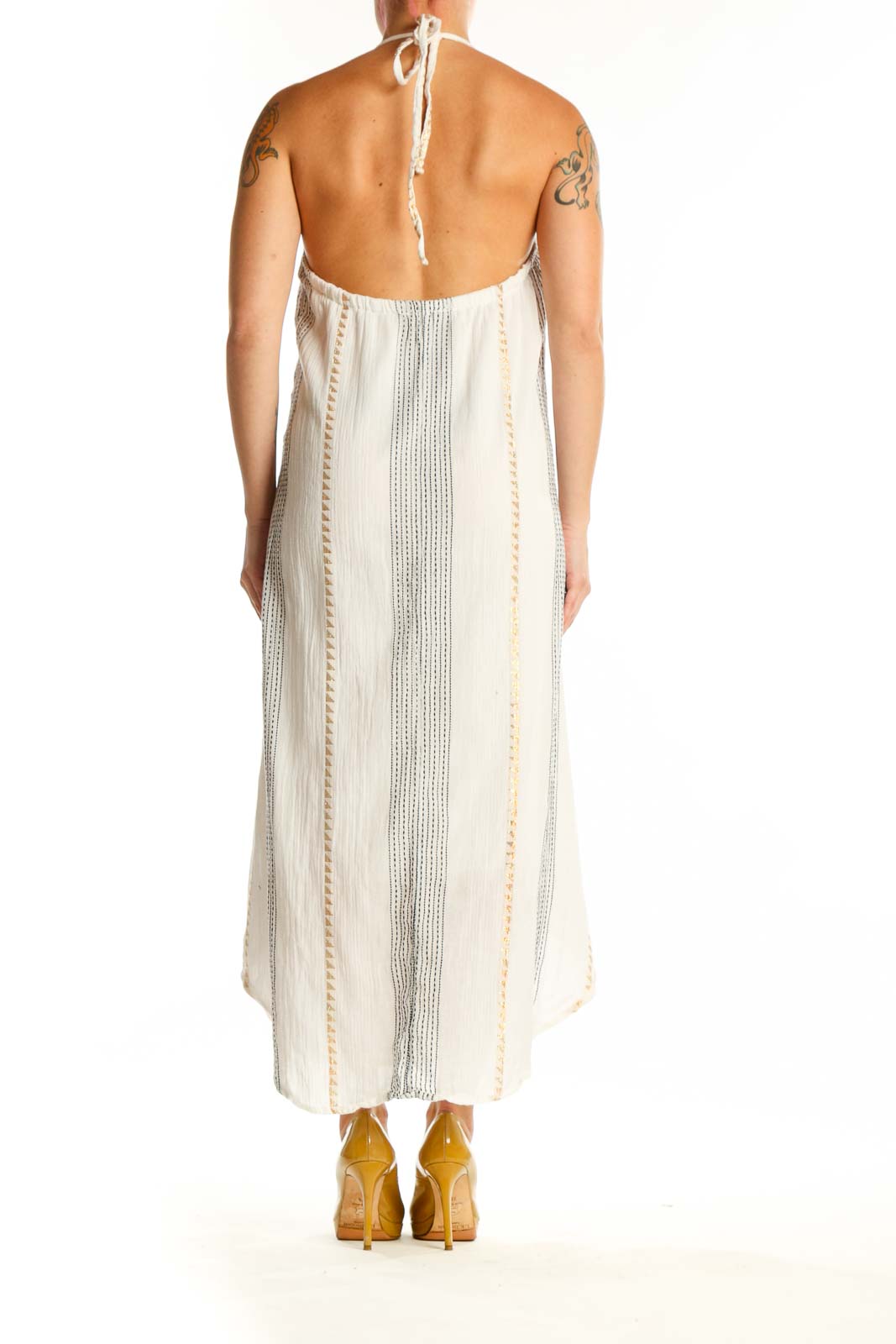 Cream striped halter midi dress with asymmetrical hemline, back view