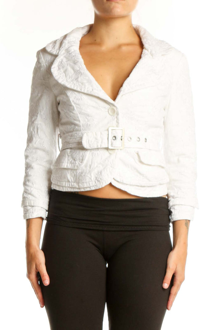 White cotton cropped blazer with belted waist and notch lapel collar, front view