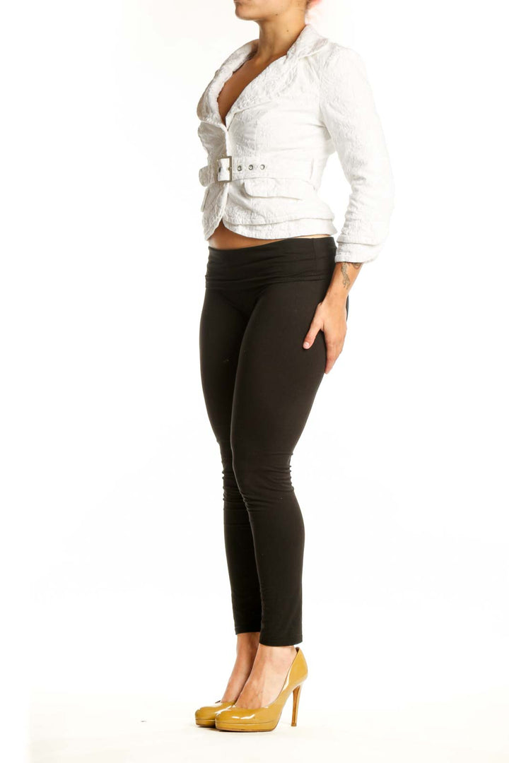 White cotton cropped blazer with belted waist and notch lapel collar, front view