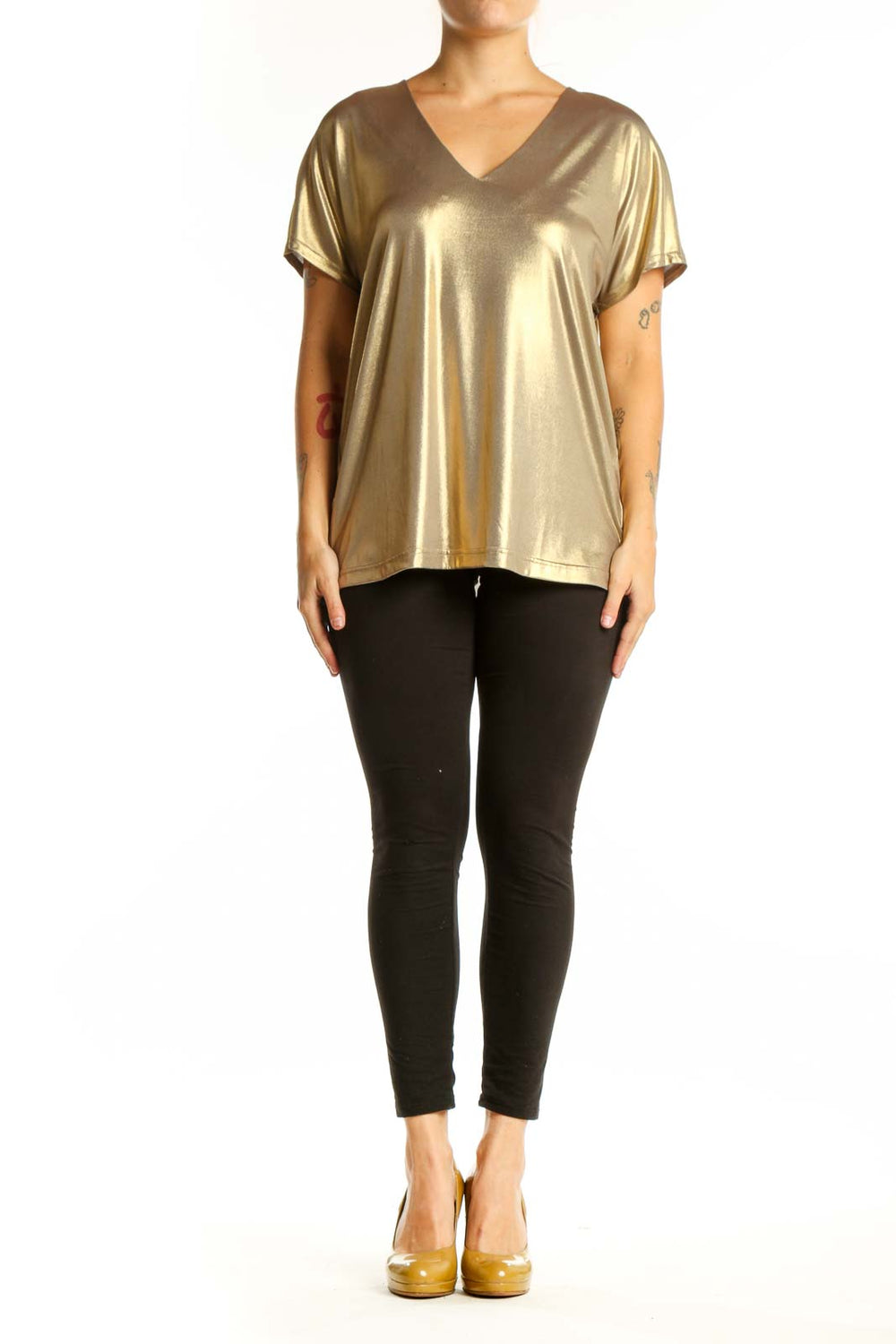 Gold metallic v-neck short sleeve top with stretch fabric, front view on model