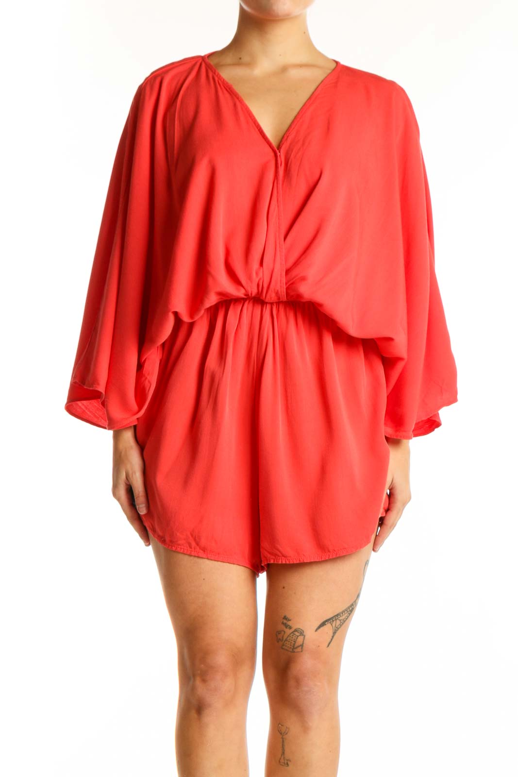 Red rayon bubble hem romper with V-neckline and voluminous sleeves, front view