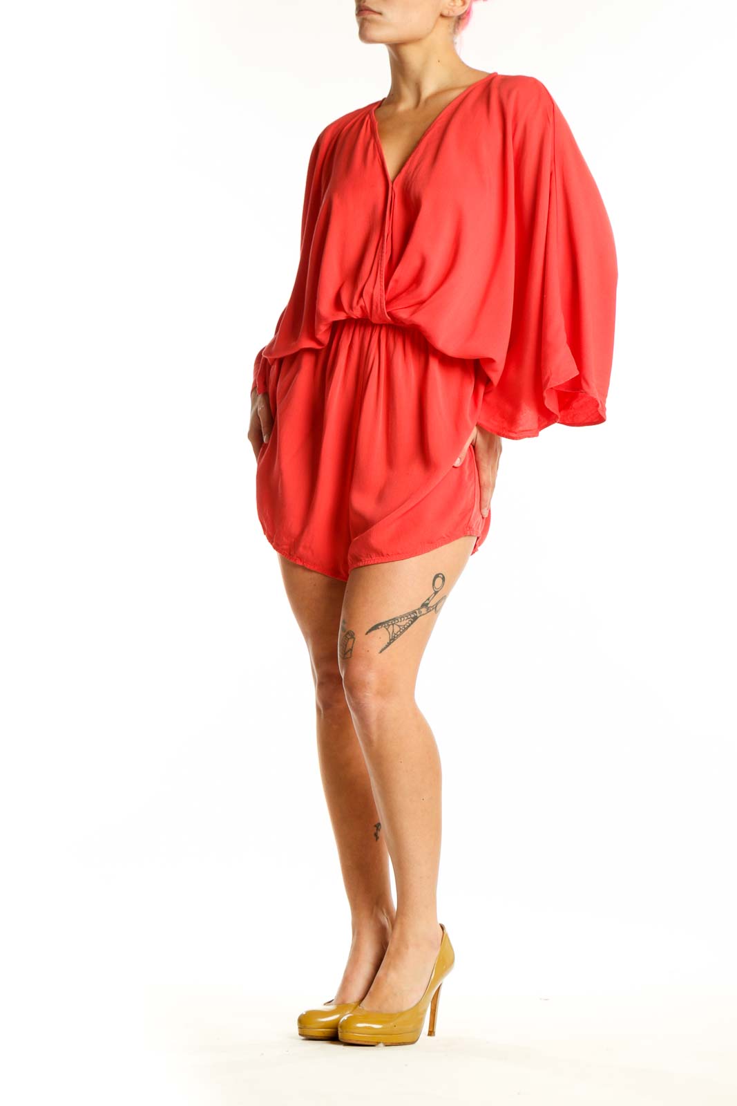 Red rayon bubble hem romper with V-neckline and voluminous sleeves, front view